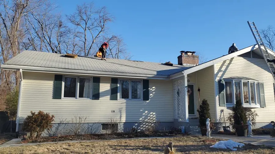 Ranch-style home with a fresh roof by Loja General Construction