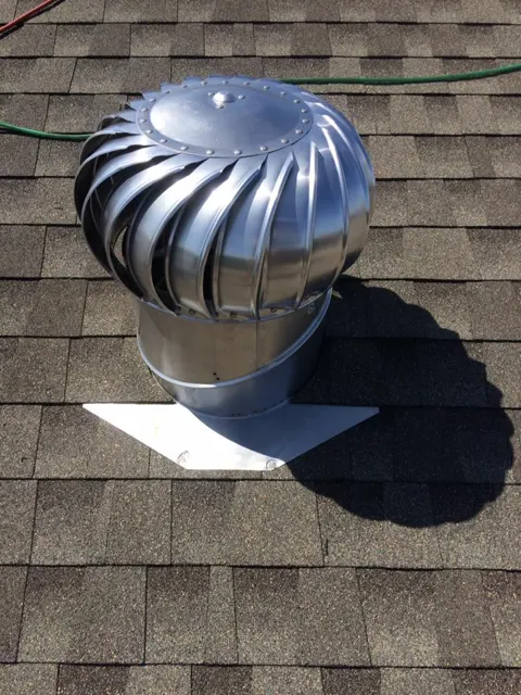 Roof turbine vent installed on shingles